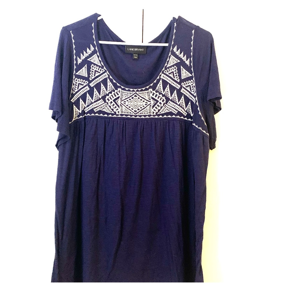 Embroidered Navy blue shirt.